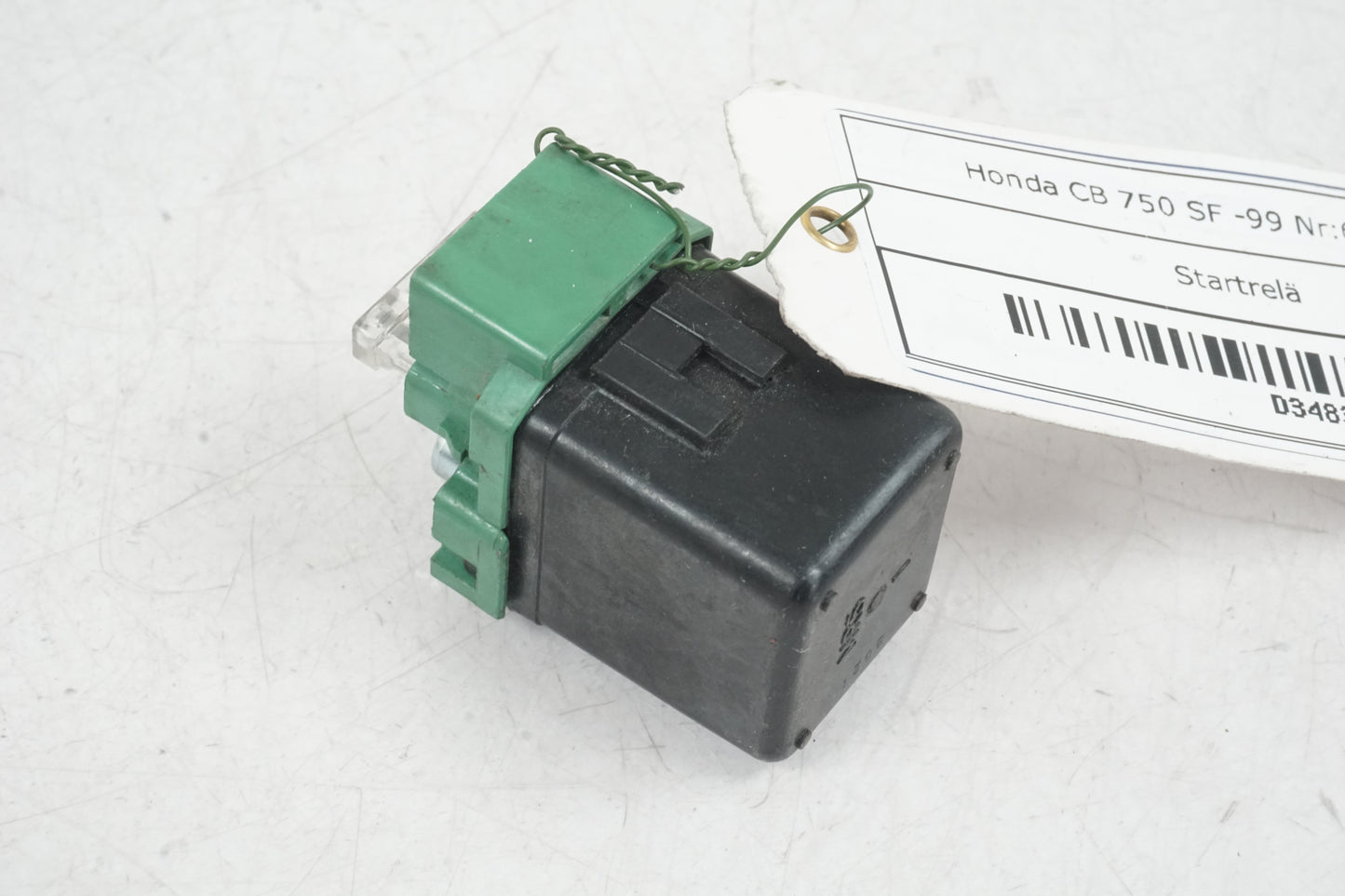 Vänster sida på Startrelä från en Honda CB 750 SF -1999 motorcykel.