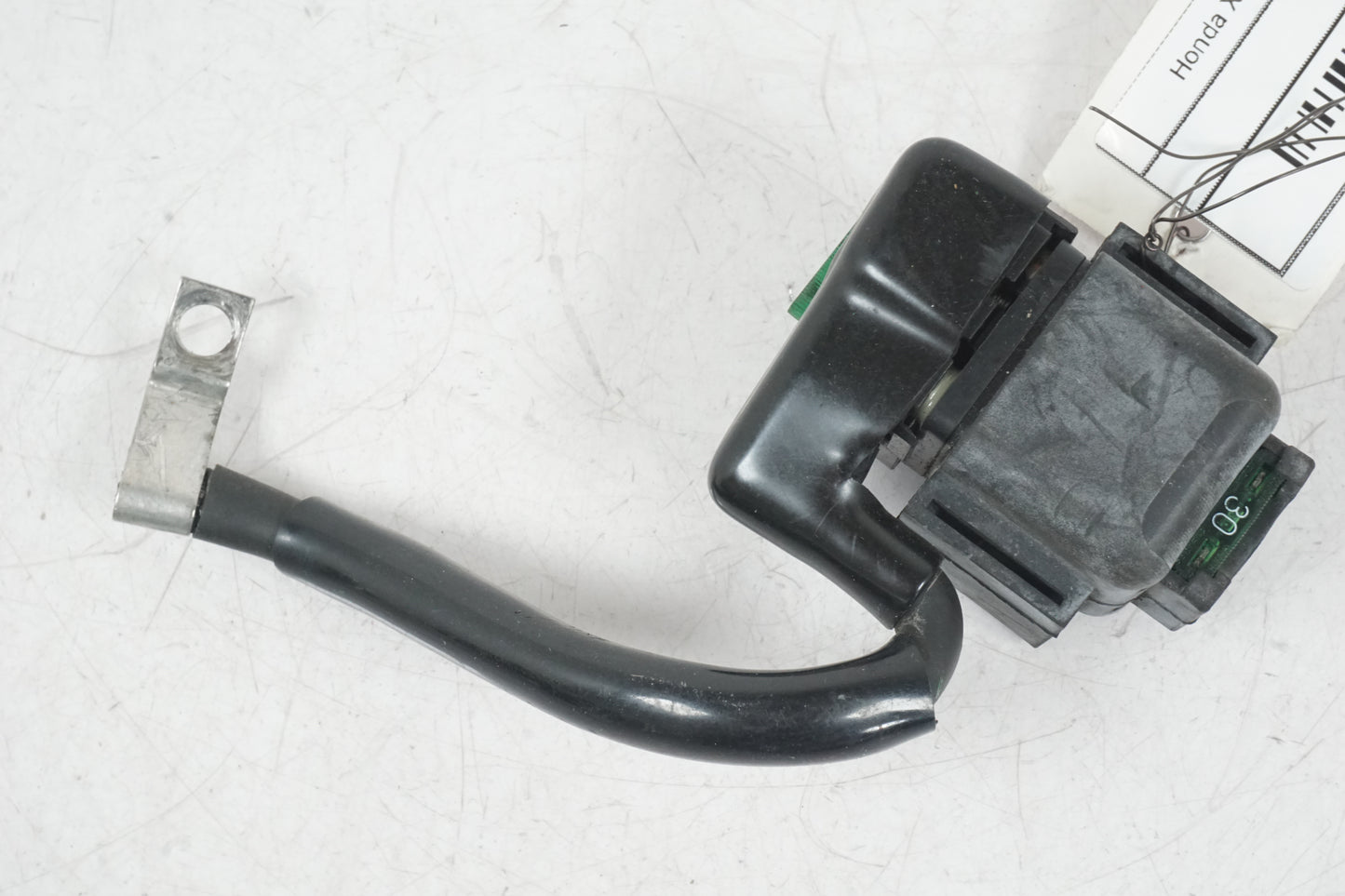 Baksidan på Startrelä från en Honda XL 650 V -2000 motorcykel.