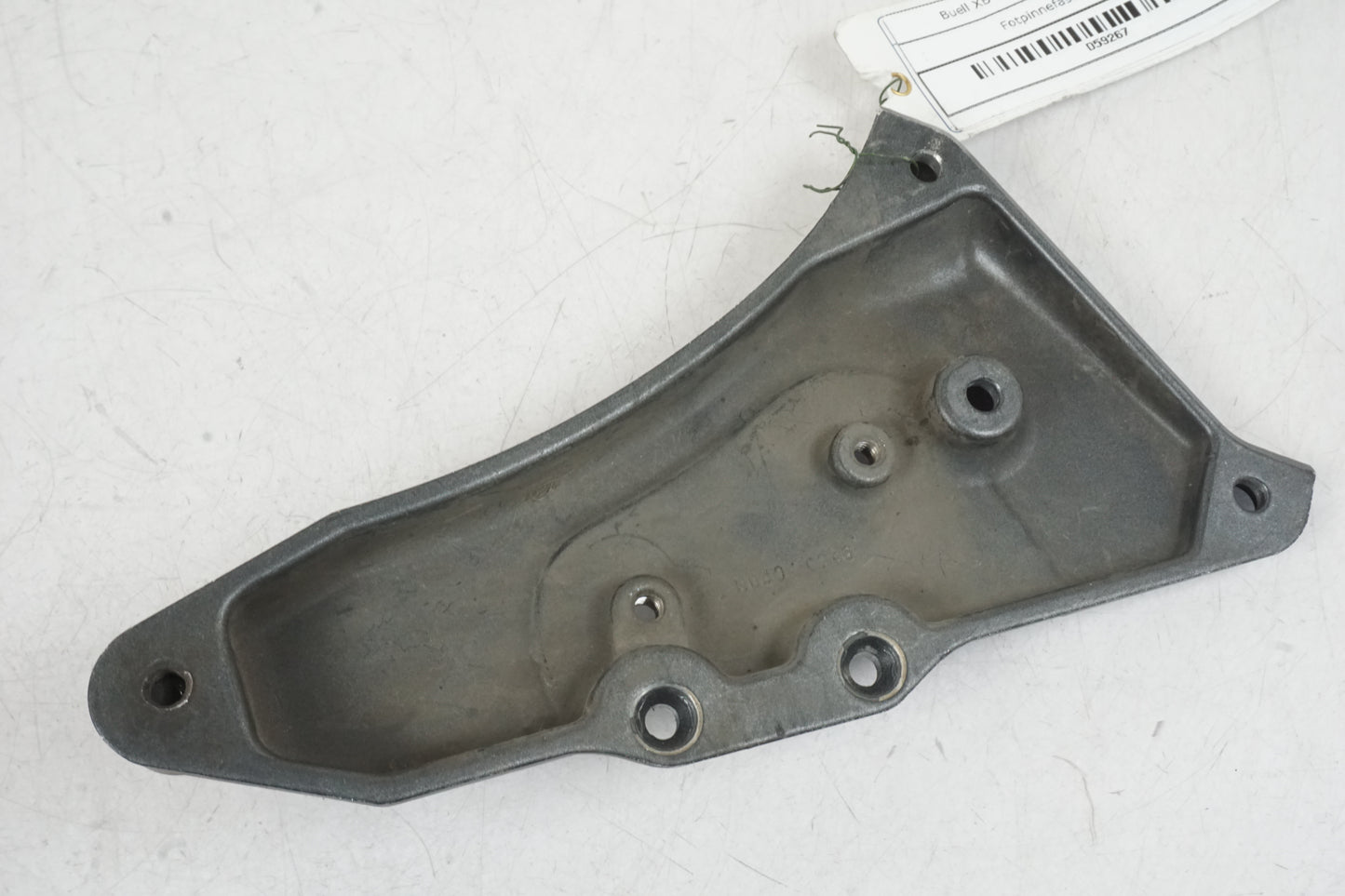 Snett uppifrån på Fotpinnefäste från en Buell XB 12 -2006 motorcykel.