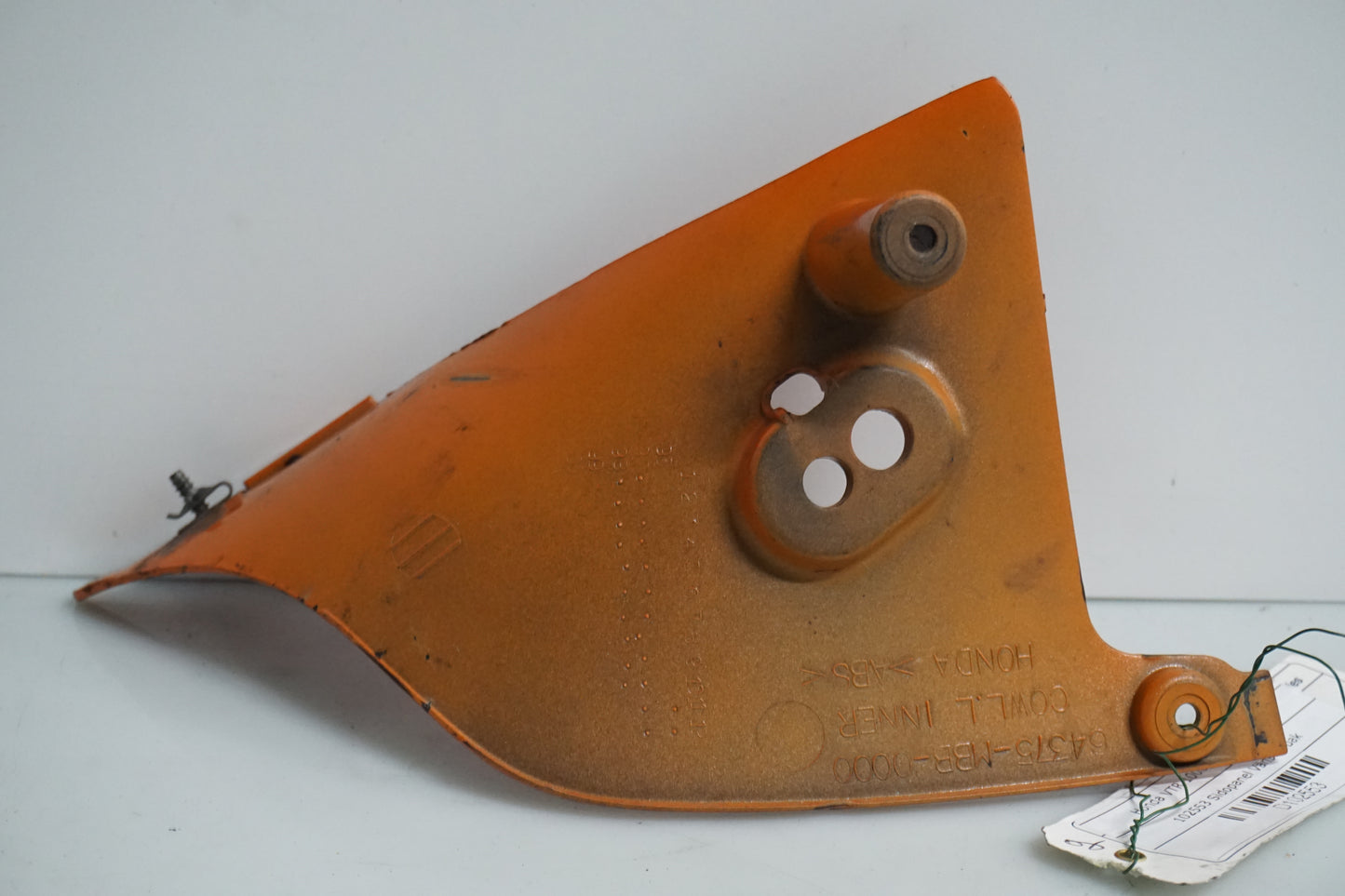 Snett nerifrån på Sidopanel från en Honda VTR 1000 F -1999 motorcykel.