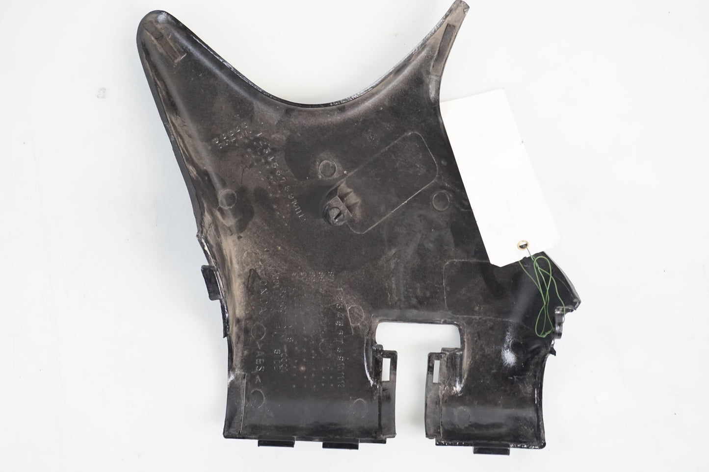 Snett nerifrån på Sidopanel från en Honda VT 600 C -1994 motorcykel.