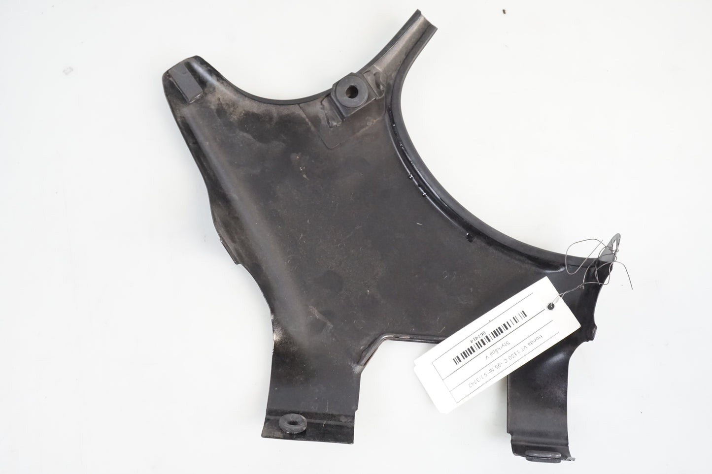 Snett nerifrån på Styrkåpa från en Honda VT 1100 C -1995 motorcykel.