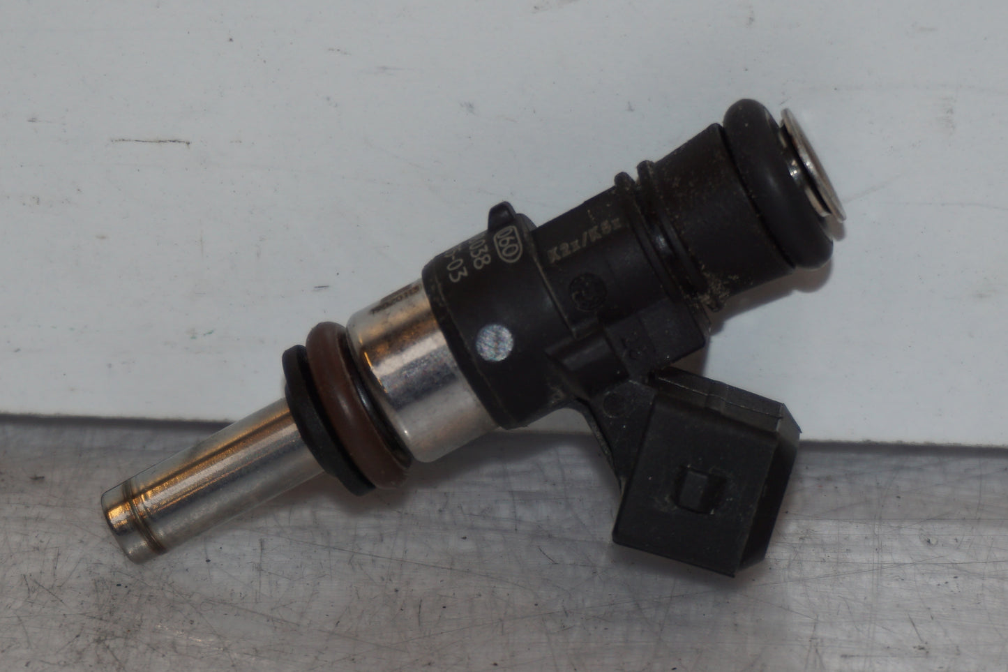 Snett nerifrån på Spridare från en BMW R 1200 RT -2013 motorcykel.