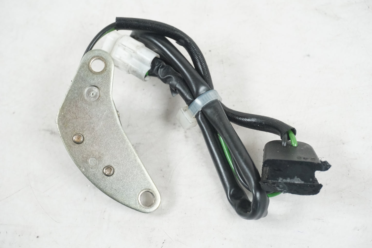 Höger sida på Tändpickup från en Suzuki GSX-R 750 -2000 motorcykel.