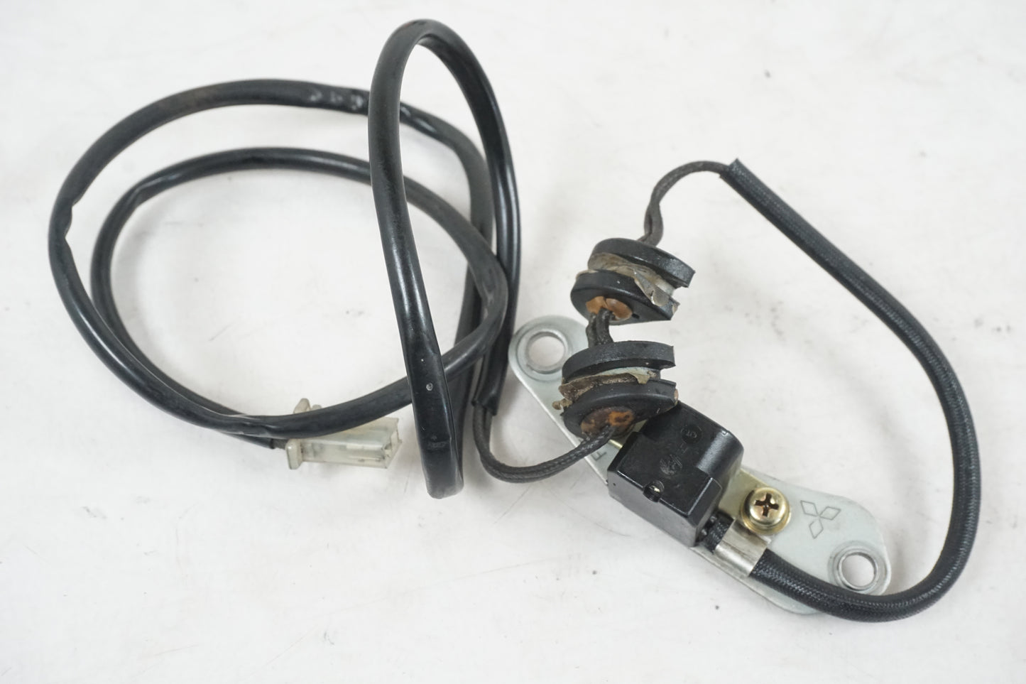 Framsidan på Tändpickup från en Yamaha XVS 650 -1997 motorcykel.