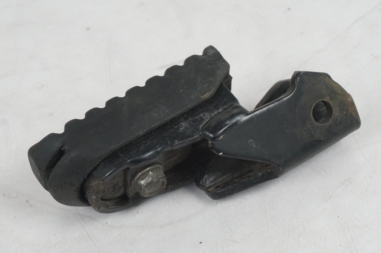 Höger sida på Fotpinne från en Honda XR 125 -2004 motorcykel.