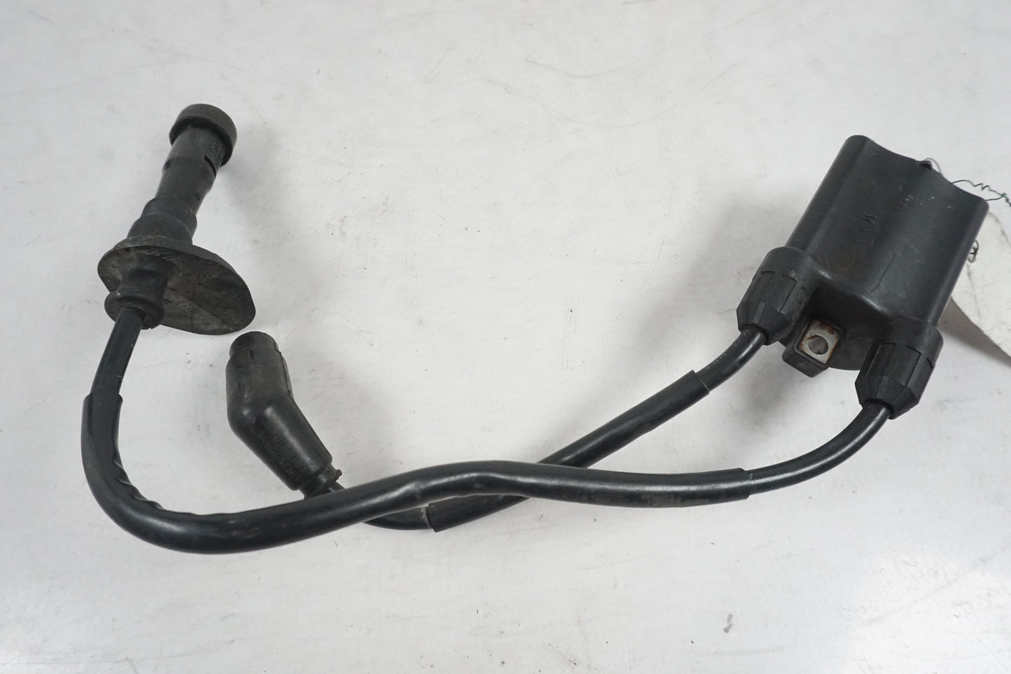 Snett nerifrån på Tändspole från en Honda XL 650 V -2007 motorcykel.