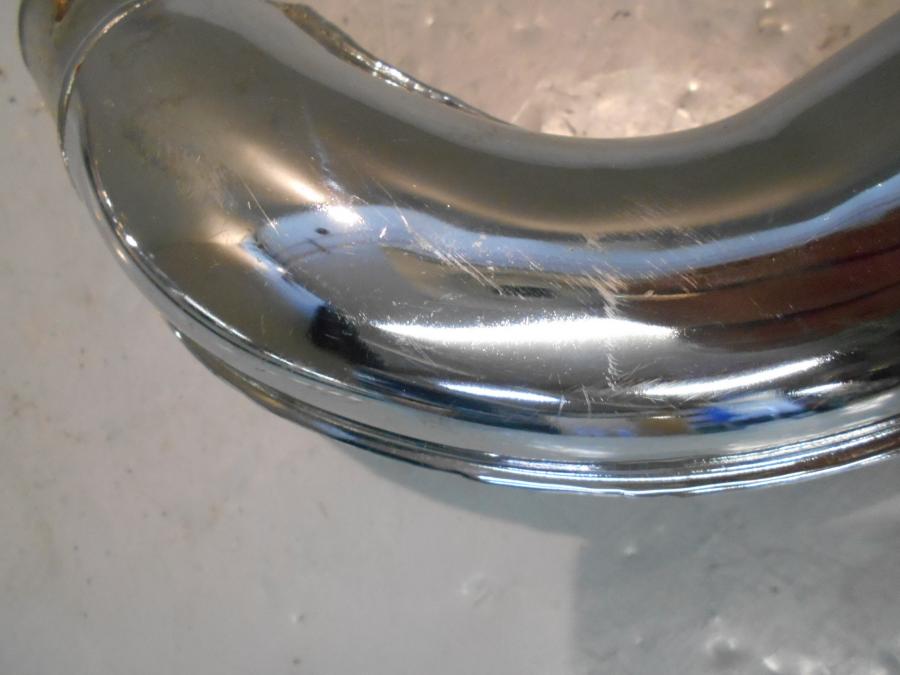 Höger sida på Ljuddämpare från en Triumph Rocket III -2006 motorcykel.