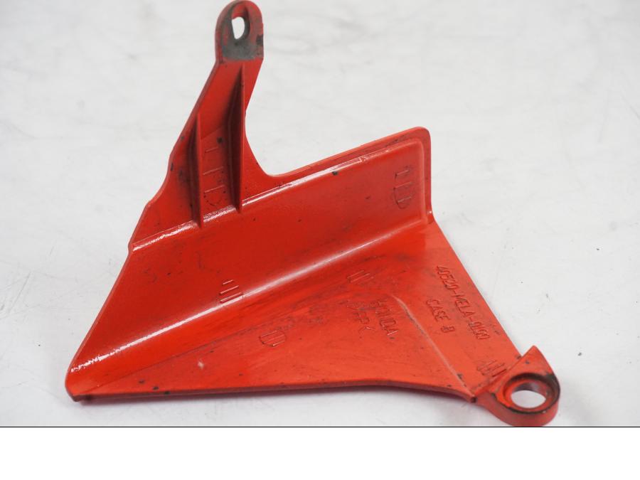 Höger sida på Kedjeskydd från en Honda CBR 1000 RR -2007 motorcykel.