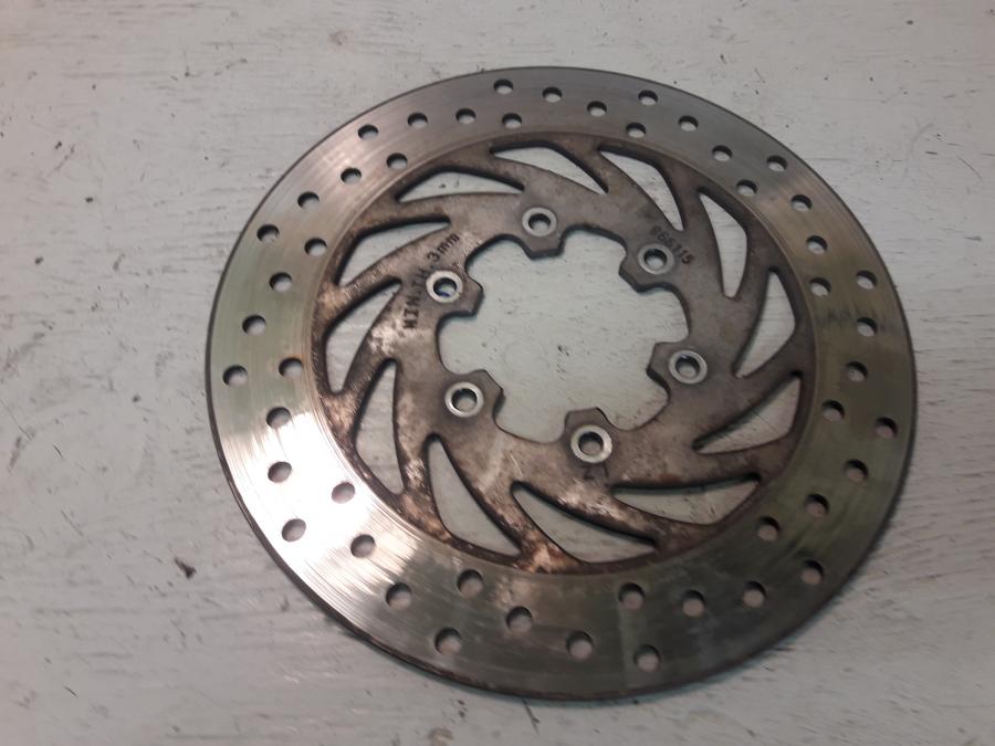 Framsidan på Bromsskiva från en Aprilia RS 125 -2017 motorcykel.