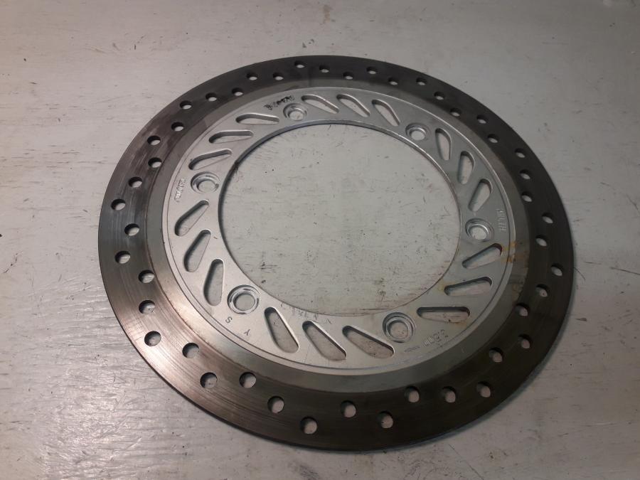 Framsidan på Bromsskiva från en Honda CBR 125 R -2008 motorcykel.