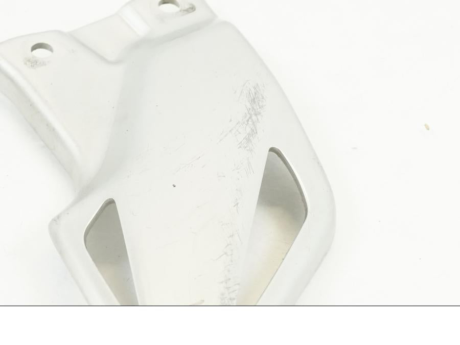 Vänster sida på Fotpinnehälskydd från en Honda CBR 1000 RR -2010 motorcykel.