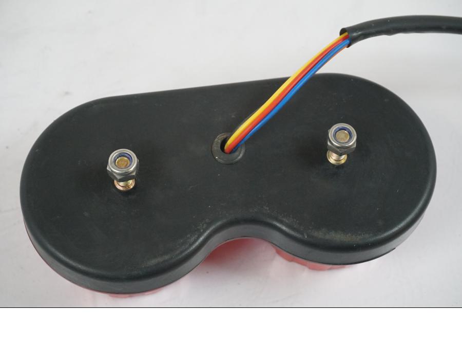 Snett nerifrån på Baklampa från en Aprilia RS 125 -2000 motorcykel.