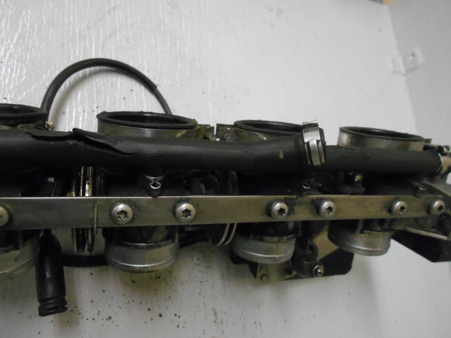 Vänster sida på Spjällhus från en BMW K 1200 LT -2007 motorcykel.