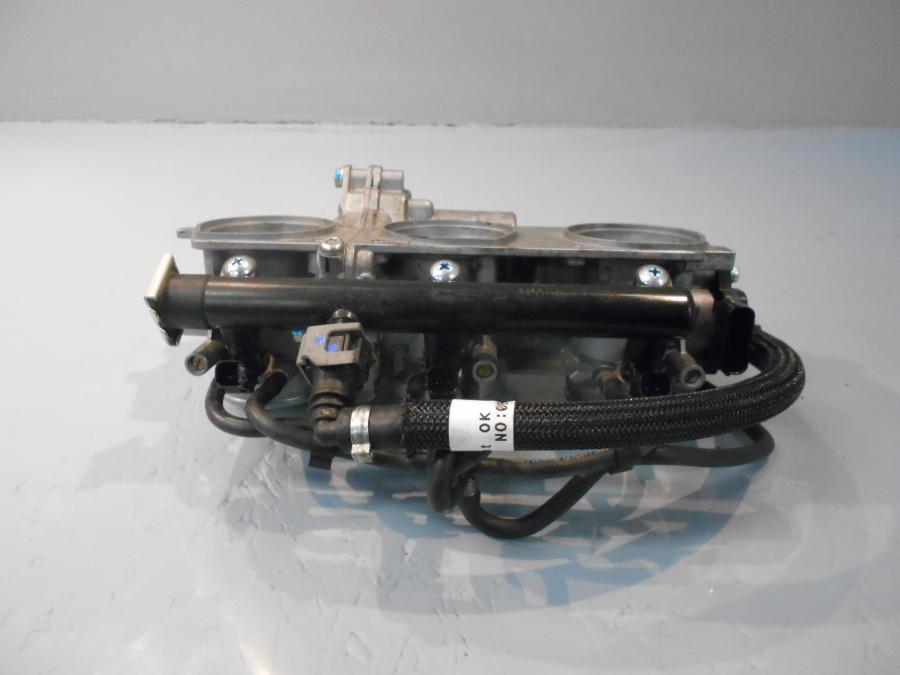 Höger sida på Spjällhus från en Triumph Tiger 800 -2016 motorcykel.