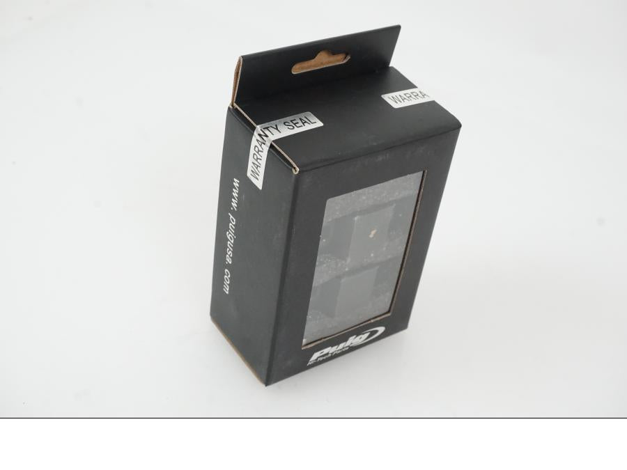 Snett uppifrån på Styrfäste från en Universal Universal -2023 moped.