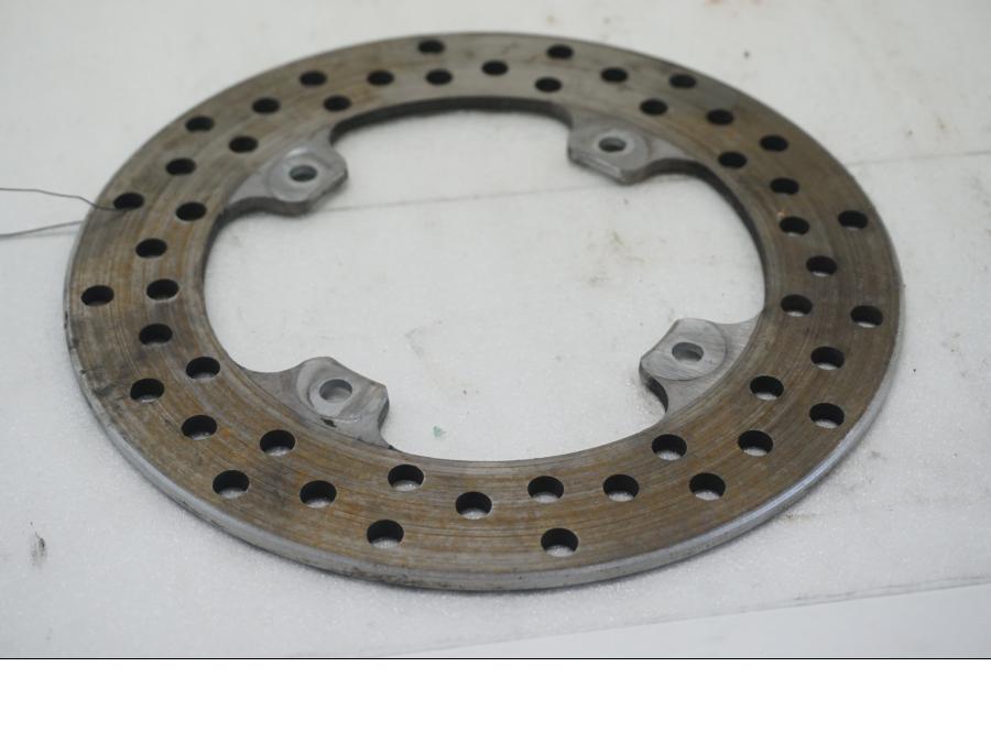 Baksidan pÄ Bromsskiva frÄn en MV Agusta Brutale 800 -2014 motorcykel.