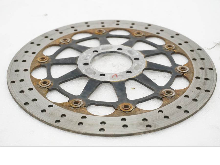 Baksidan på Bromsskiva från en Ducati Monster 696 -2010 motorcykel.