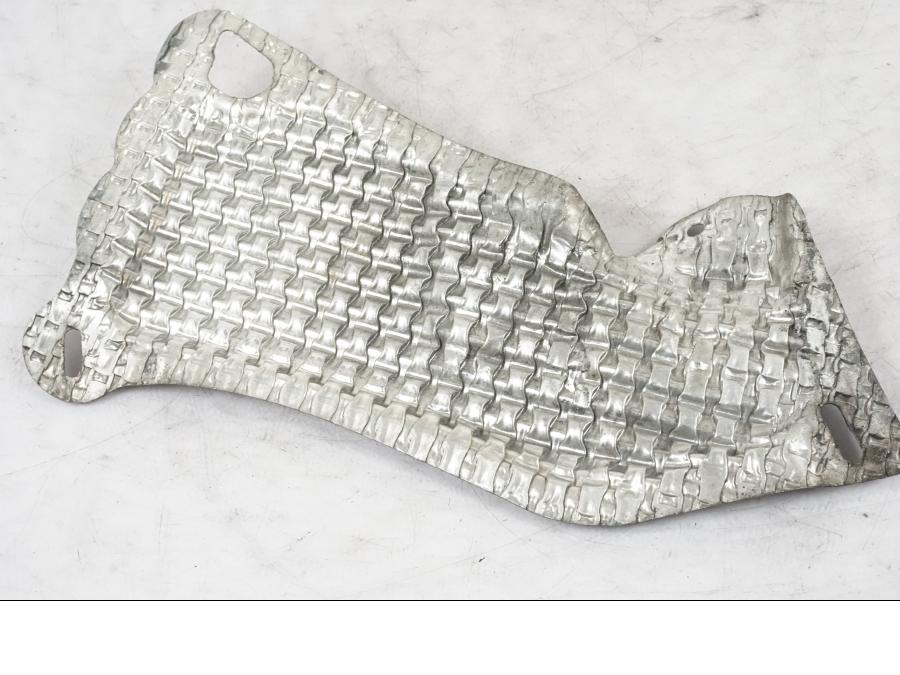 Baksidan på Värmeskydd från en Suzuki GSX-R 750 -2007 motorcykel.