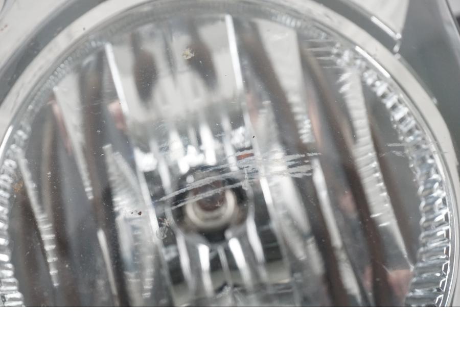 Baksidan på Strålkastare från en Kawasaki ER-6N ABS -2010 motorcykel.