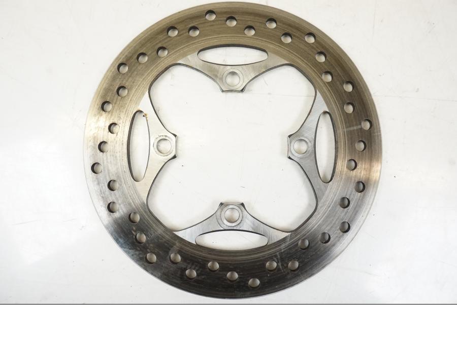 Vänster sida på Bromsskiva från en Triumph Speed Triple -2021 motorcykel.