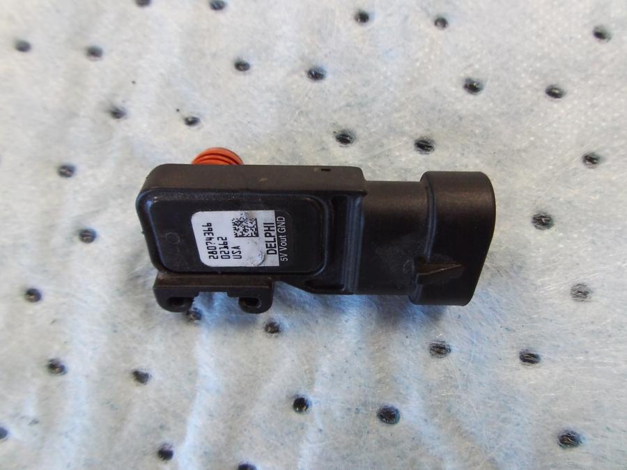 Framsidan på Spjällhus från en H-D Softail Deluxe / Nostalgia FLSTN -2011 motorcykel.