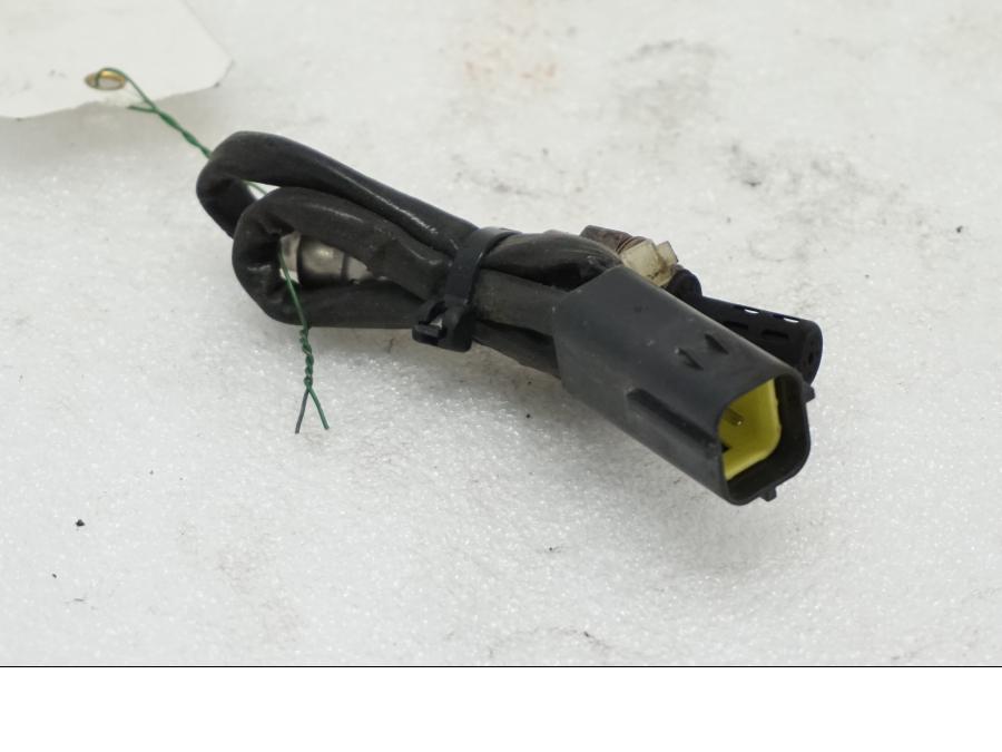 Framsidan på Lambdasond från en Ducati Monster 696 -2010 motorcykel.