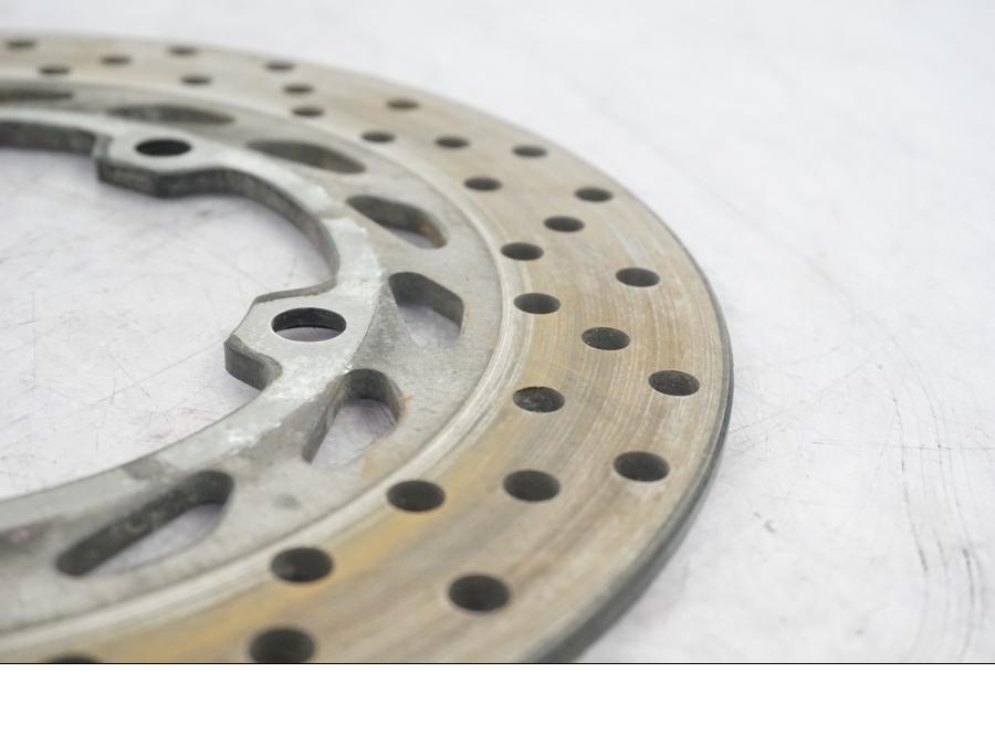 Vänster sida på Bromsskiva från en Yamaha FZ-6 -2007 motorcykel.