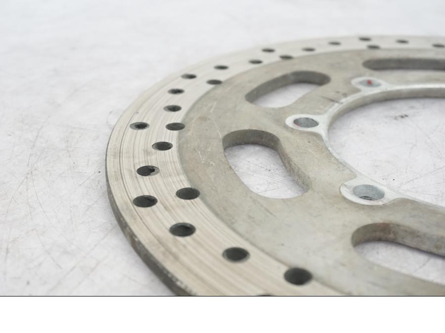 VÀnster sida pÄ Bromsskiva frÄn en Kawasaki VN 1500 Classic Tourer -2001 motorcykel.