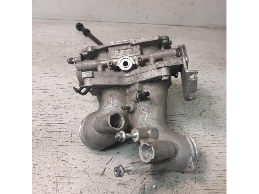 Baksidan på Spjällhus från en Honda VTX 1800 -2007 motorcykel.