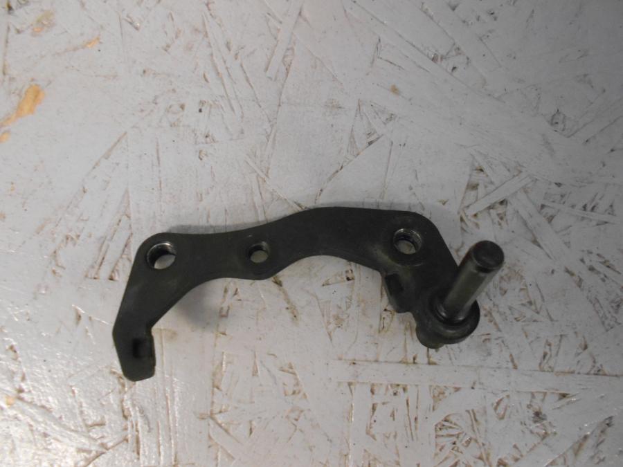 Framsidan på Bromsoksfäste från en Triumph Bonneville -2001 motorcykel.