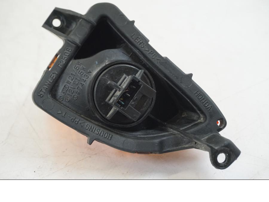 Vänster sida på Blinkers från en Honda VFR 800 -2003 motorcykel.