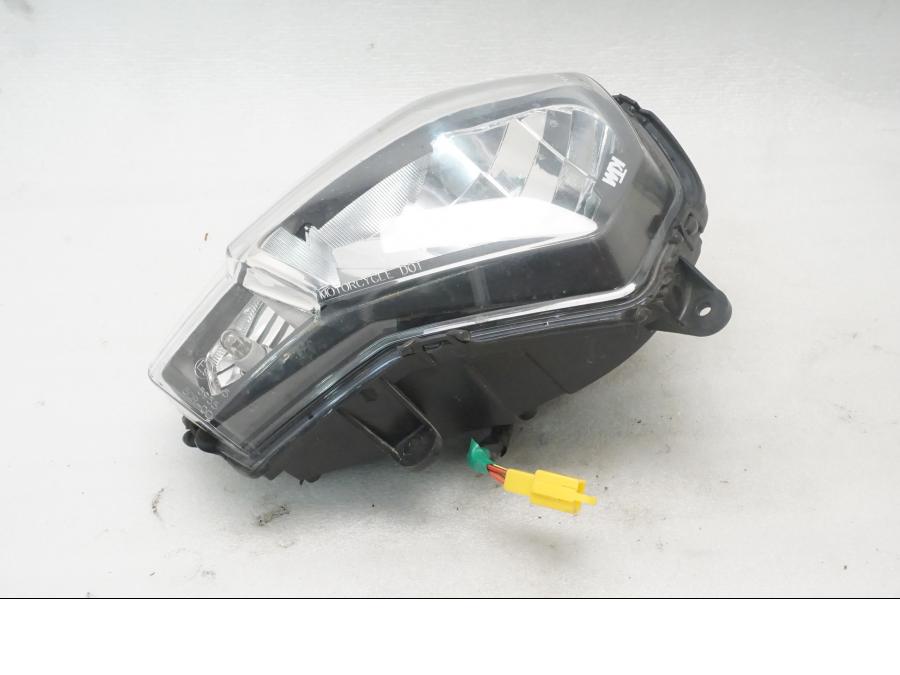 Vänster sida på Strålkastare från en KTM 125 Duke -2015 motorcykel.