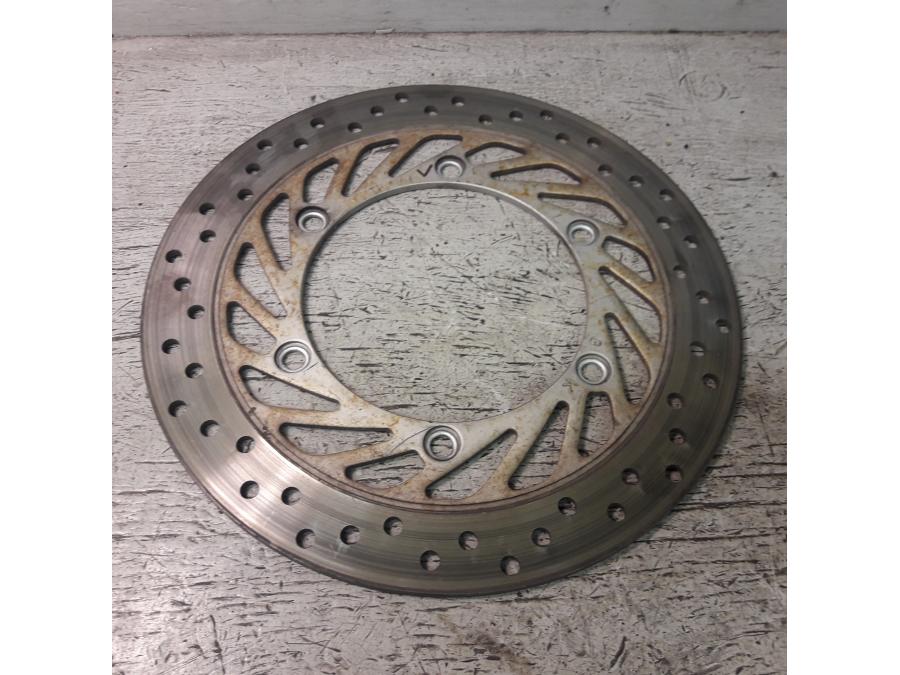 Framsidan på Bromsskiva från en Honda VFR 750 -1993 motorcykel.