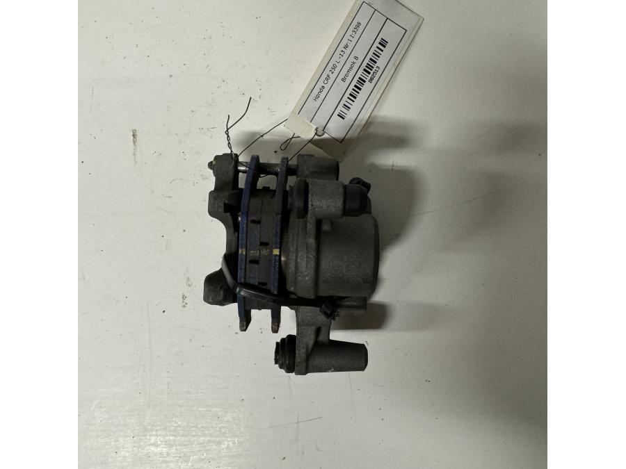 Höger sida på Bromsok från en Honda CRF 250 -2013 motorcykel.