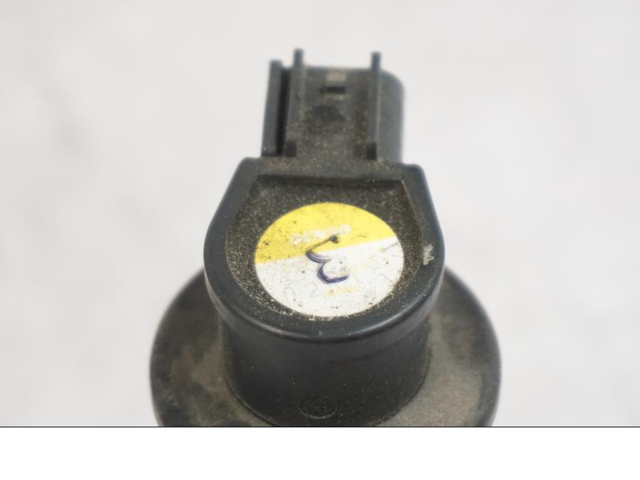 Vänster sida på Tändspole från en Triumph Tiger -2009 motorcykel.