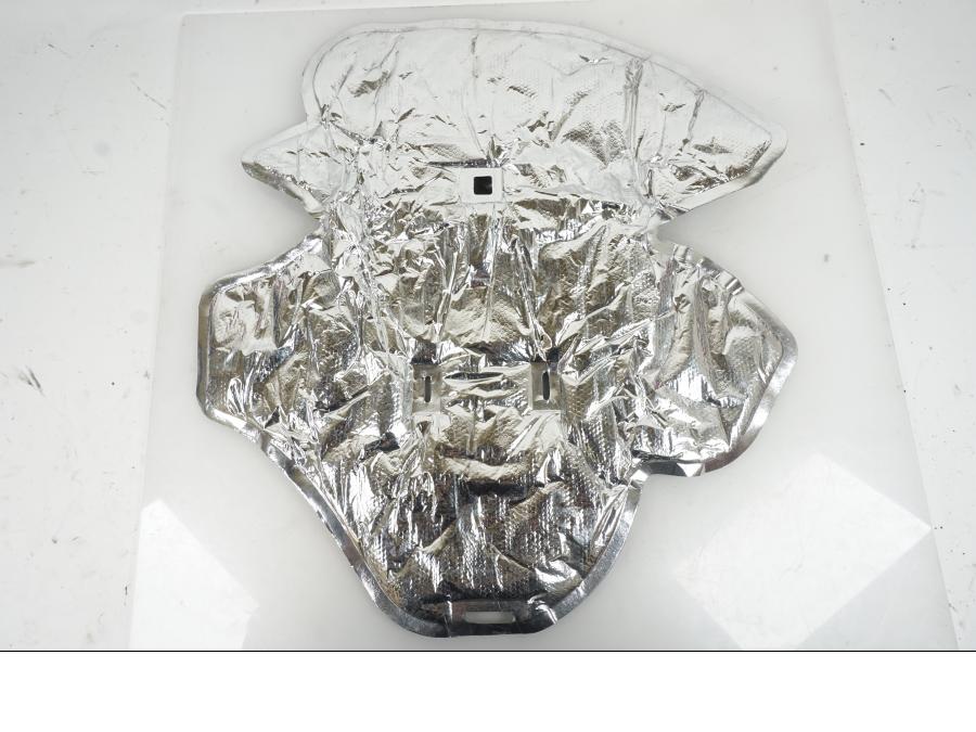 Baksidan på Värmeskydd från en Suzuki GSX-R 1000 -2007 motorcykel.