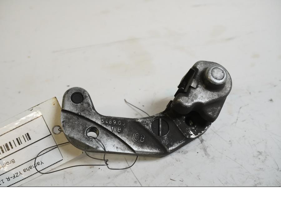 Baksidan på Bromsoksfäste från en Yamaha YZF-R 125 -2009 motorcykel.