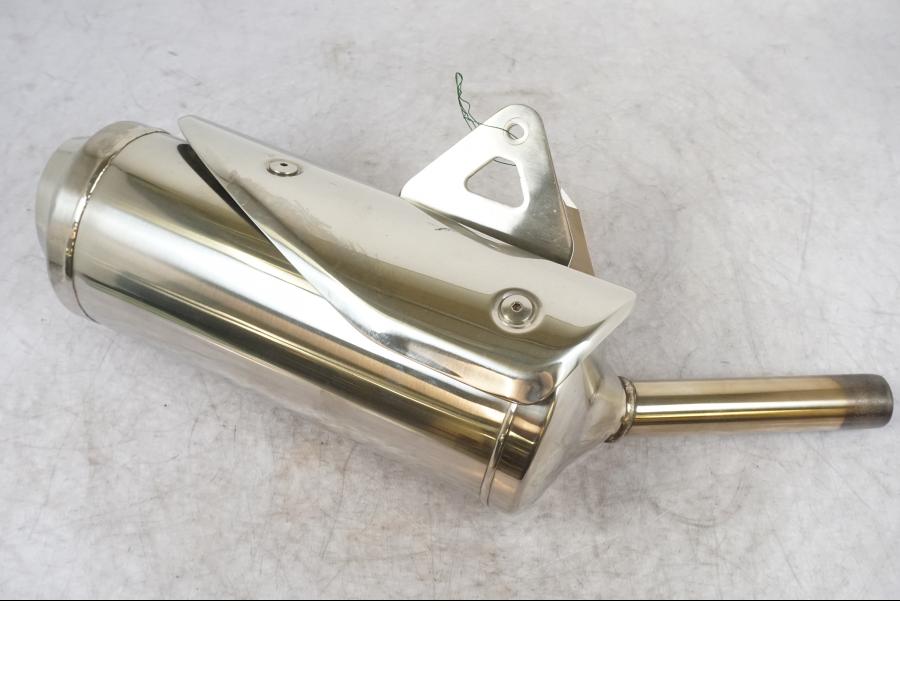 Snett uppifrån på Ljuddämpare från en Triumph Street Triple R -2009 motorcykel.