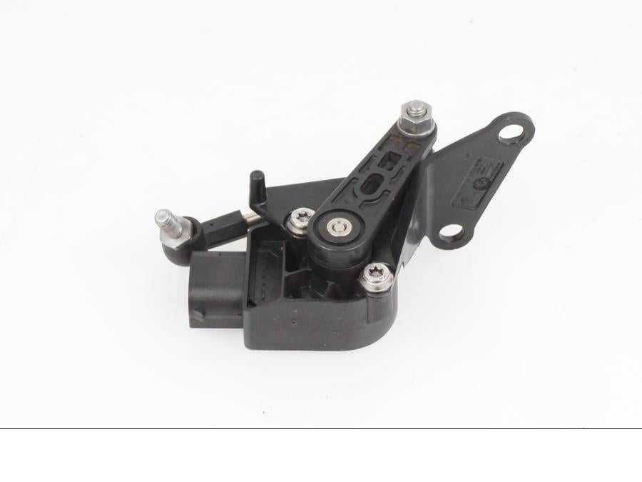 Baksidan på Strålkastarjusteringsreglage från en BMW S 1000 XR -2019 motorcykel.