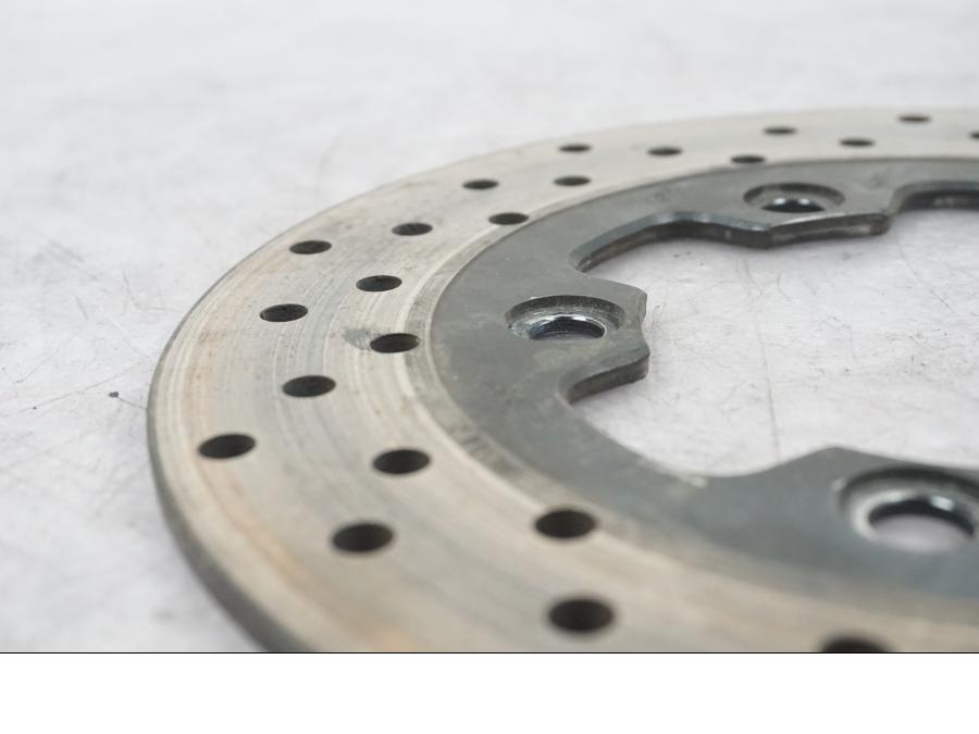 Vänster sida på Bromsskiva från en Suzuki TL 1000 S -1997 motorcykel.