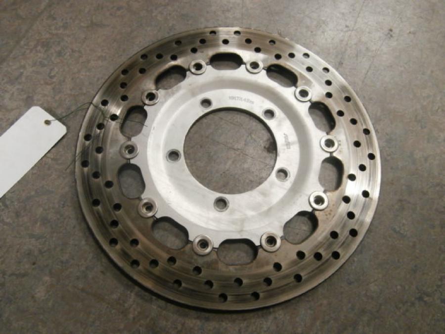 Framsidan på Bromsskiva från en Triumph Rocket III -2011 motorcykel.