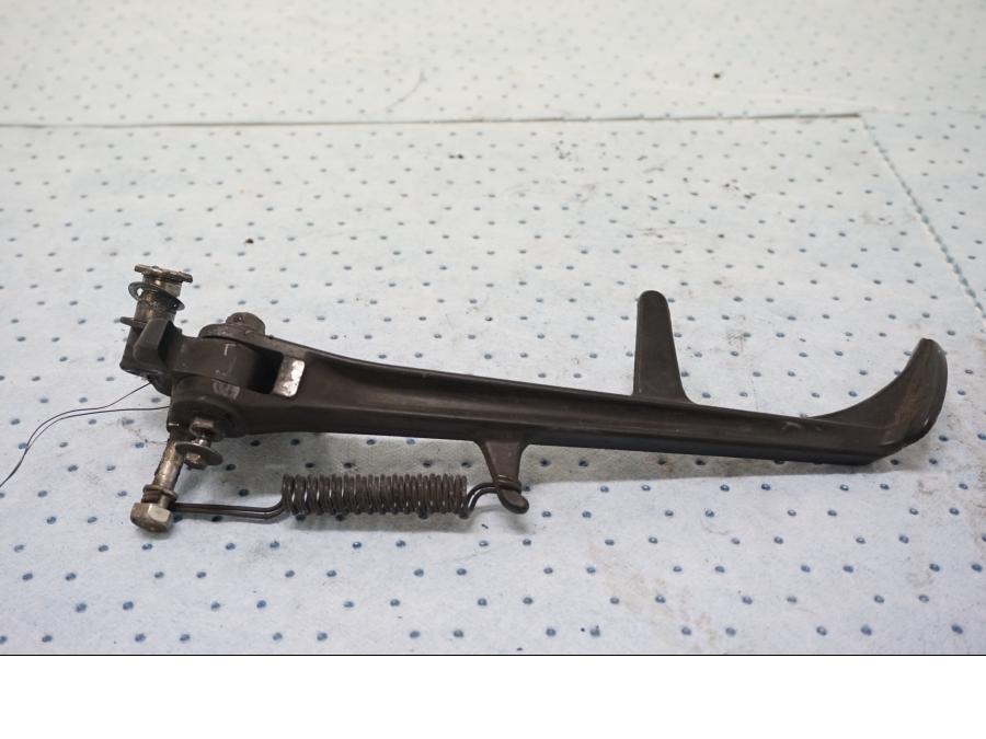 Baksidan pÄ Sidostöd frÄn en Honda CBR 1000 RR -2011 motorcykel.