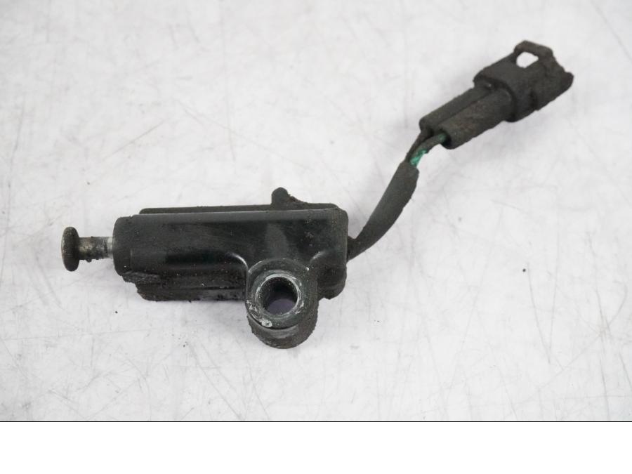 Baksidan på Sidostödsbrytare från en Suzuki GSX-R 1000 -2008 motorcykel.