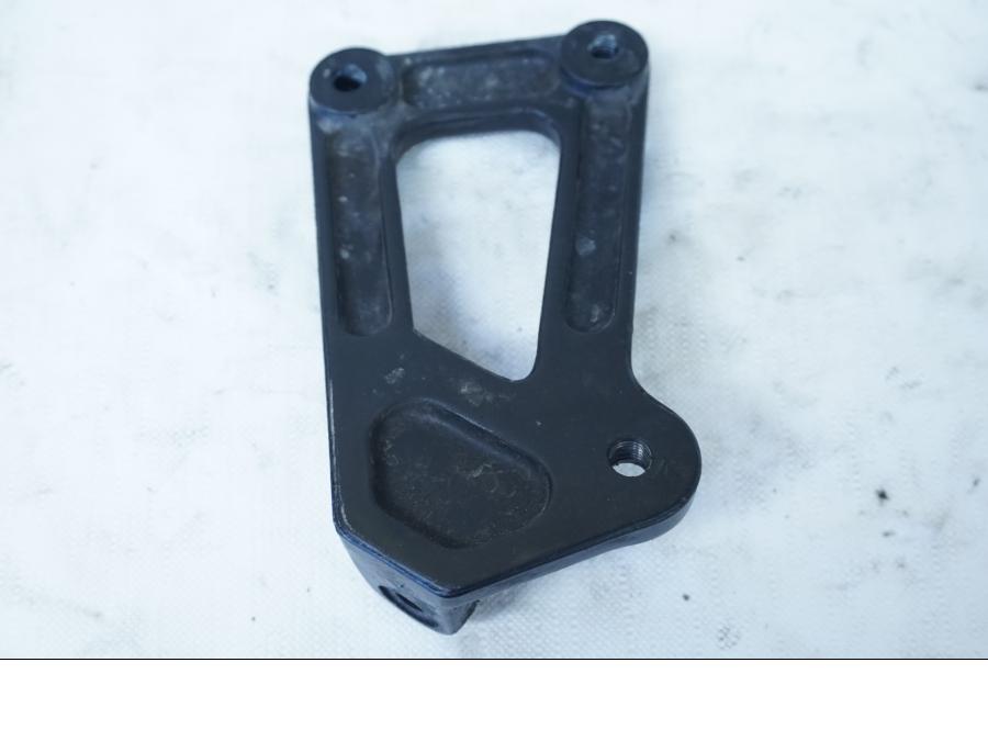 Baksidan på Fotpinnefäste från en Ducati 750 SS -1995 motorcykel.