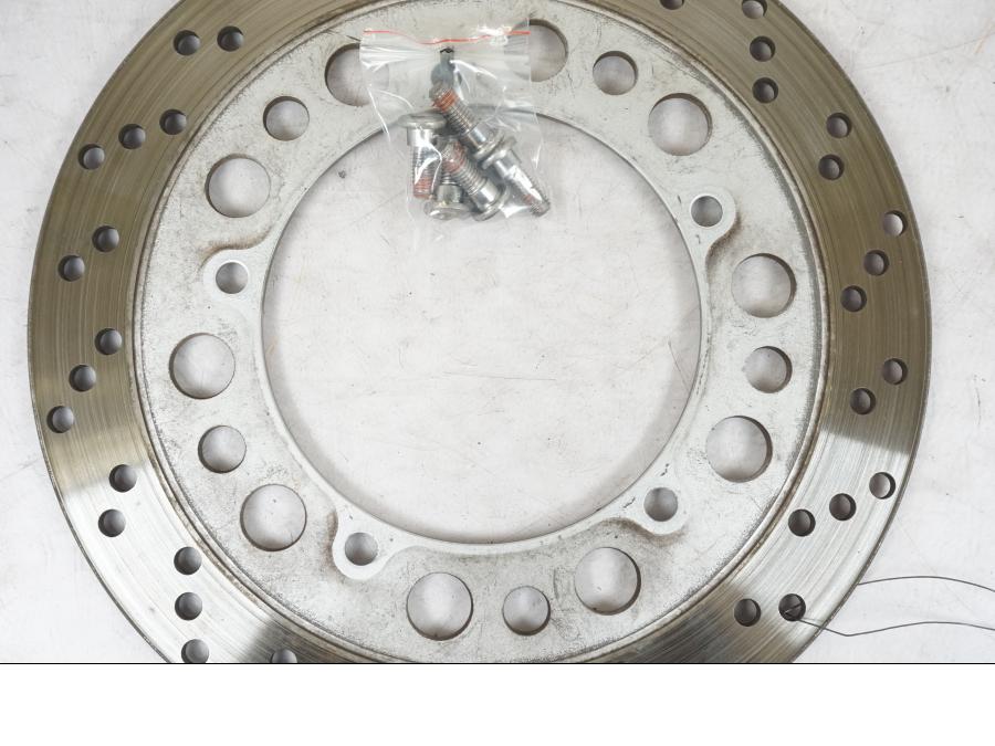 Snett uppifrån på Bromsskiva från en Honda VT 600 C -1998 motorcykel.