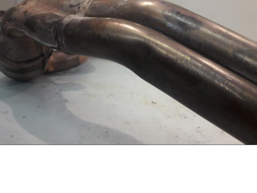 Vänster sida på Grenrör från en BMW F 800 GS -2009 motorcykel.