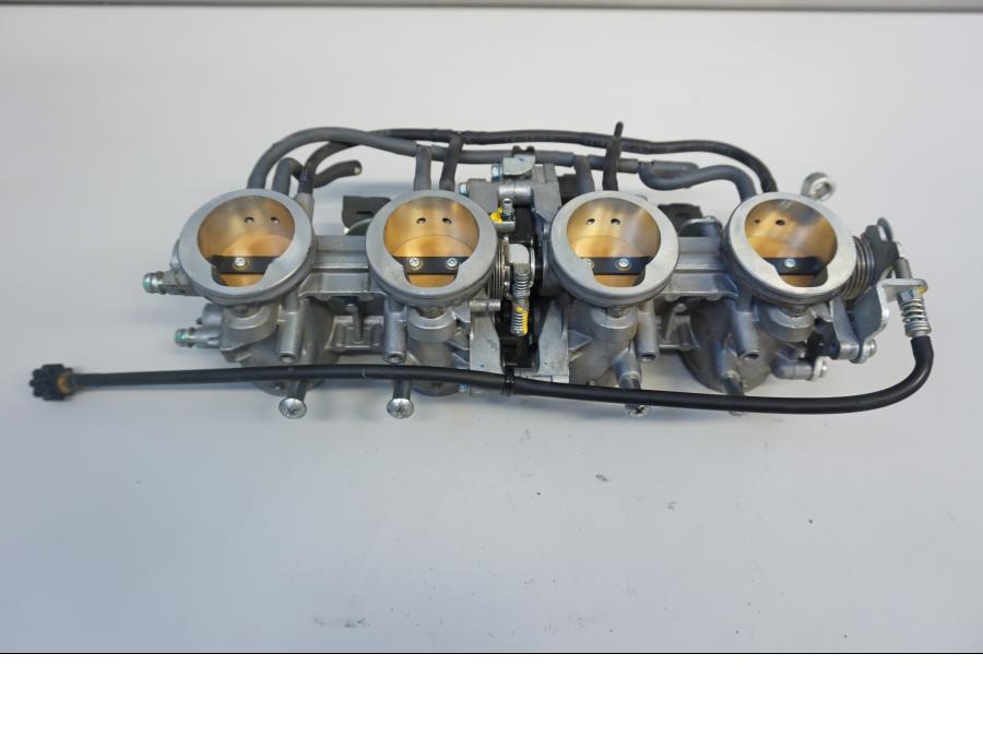 Höger sida på Spjällhus från en Kawasaki Versys 1000 -2015 motorcykel.