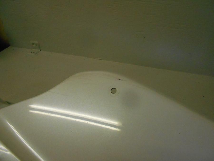 Vänster sida på Magkåpa från en Yamaha YZF-R 125 -2012 motorcykel.