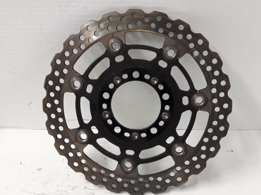 Baksidan på Bromsskiva från en Kawasaki ER-6N -2015 motorcykel.